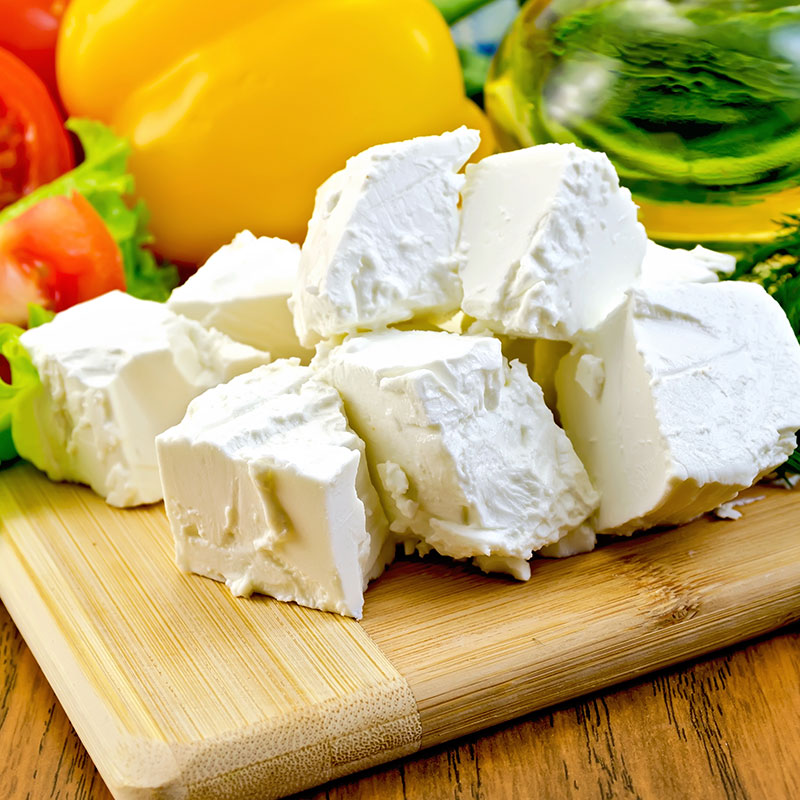 Feta Cheese on board | Featured image for cheese wholesaler.